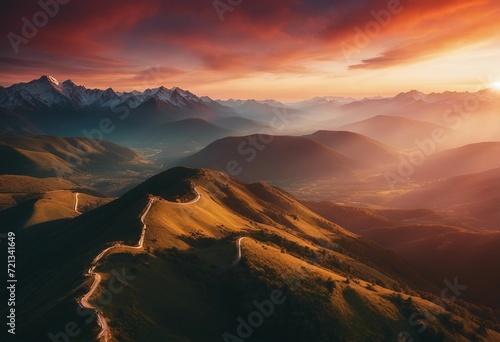 Beautiful sunset in the mountains Landscape with mountain valley colorful and clouds Aerial view © ArtisticLens