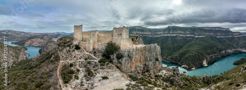 Quadro su tela Aerial panoramic view of Chirel castle atop a rocky crag jutting out over el Jug