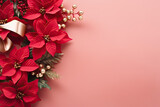 Christmas background with red poinsettia and gift box on red background