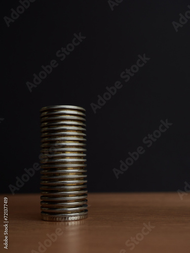 coins are arranged in the form of a building
