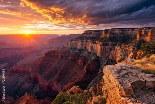 Breathtaking sunrise at the Grand Canyon, with vibrant hues painting the vast rock formations.