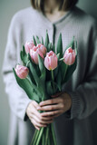 Woman with a bouquet of tulips