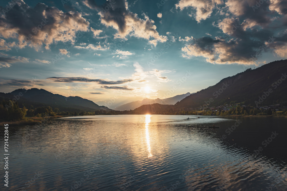 Scenic sunset on the lake in the Alps.