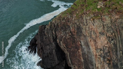 4k Epic Aerial View Of England's Coast, Baggy Point, North Devon photo