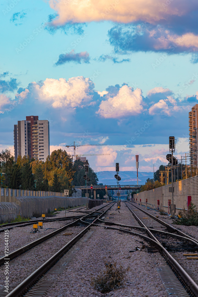 clouds over the railroad tracks
