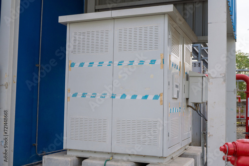 Step down transformer on power plant project. The photo is suitable to use for industry background photography, power plant poster and electricity content media.