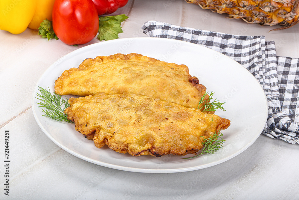 Homemade fried cheburek with meat