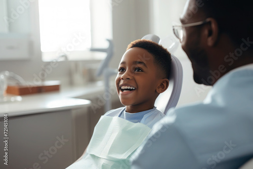 African boy visiting dentist, yearly checkup 