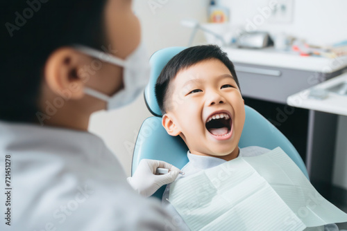 Chinese boy visiting dentist, yearly checkup 