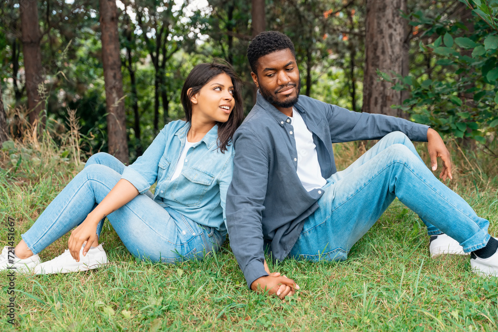 A handsome man and beautiful woman hugging each other, felling in love and spending time in the park Time together A handsome man and beautiful woman hugging each other, felling in love and spending time in the park Time together