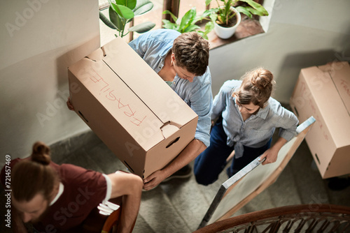 Group of students moving into the college dorm