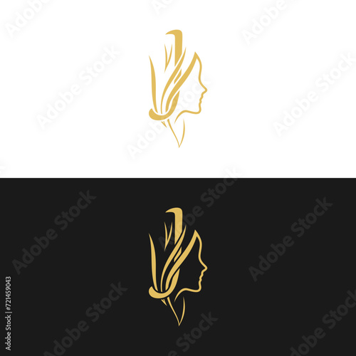 gold-colored initial 