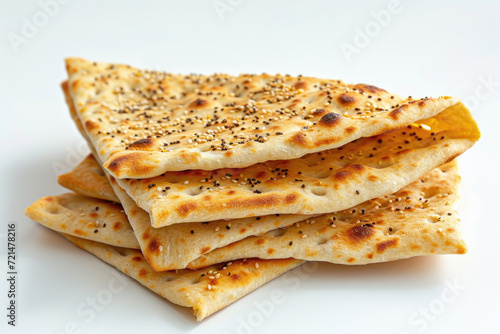 A Lavash, the traditional flatbread, elegantly isolated against a white background
