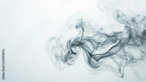 Graceful dark smoke swirls floating on a white backdrop