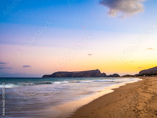 Sand beach and colorful sky on Porto Santo island at sunset
