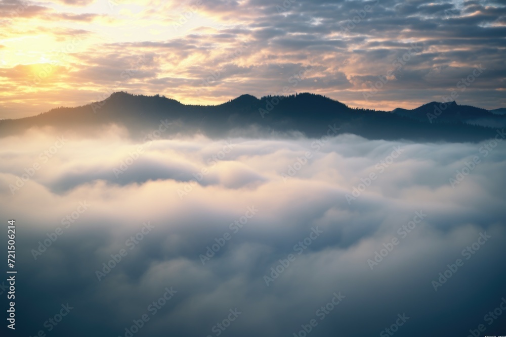A beautiful sunset scene with the sun setting over the clouds and mountains. Perfect for nature and landscape themes