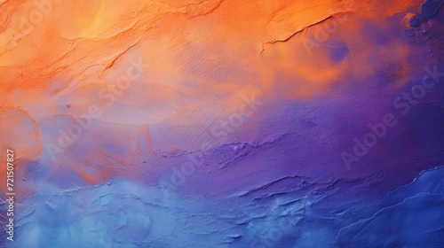 A close up view of a painting featuring vibrant orange and blue colors. This picture can be used to add a pop of color and creativity to any design project © Fotograf