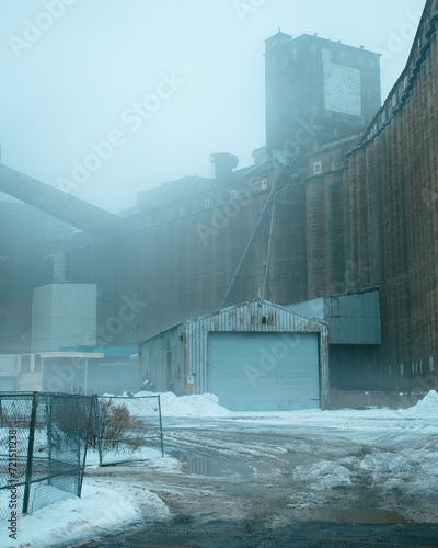 Photography Abandoned industrial buildings at Silo City on a foggy winter day, Buffalo, New