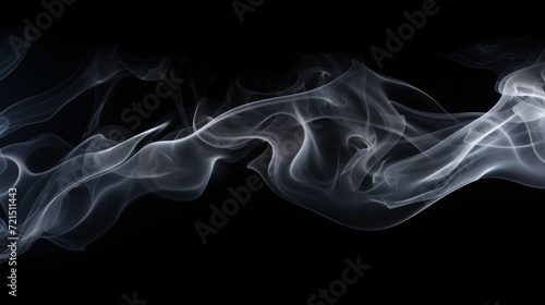 Close-up shot of smoke on a black background. Perfect for adding a dramatic or mysterious touch to any project