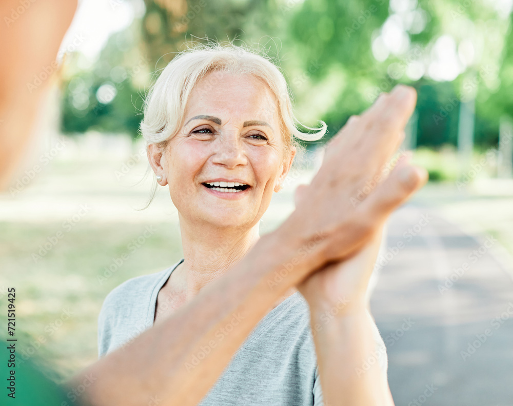 outdoor senior fitness woman man lifestyle active sport exercise healthy fit couple running jogging elderly mature success victory high five together friend portrait break outdoor senior fitness woman man lifestyle active sport exercise healthy fit couple running jogging elderly mature success victory high five together friend portrait break