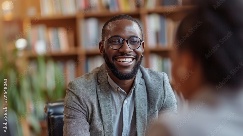 Fototapeta premium Insurance agent talking to clients in his office