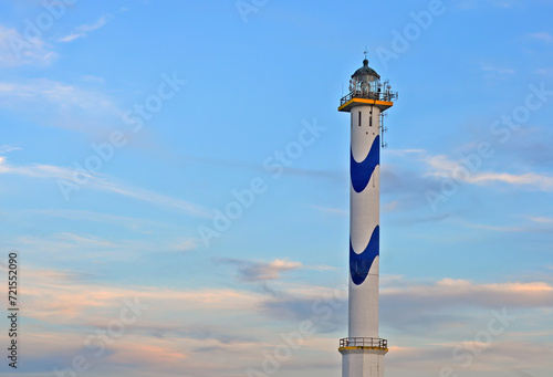 Lighthouse 'Lange Nelle', active since 1949, on a summer evening in Ostend, Flanders, Belgium photo