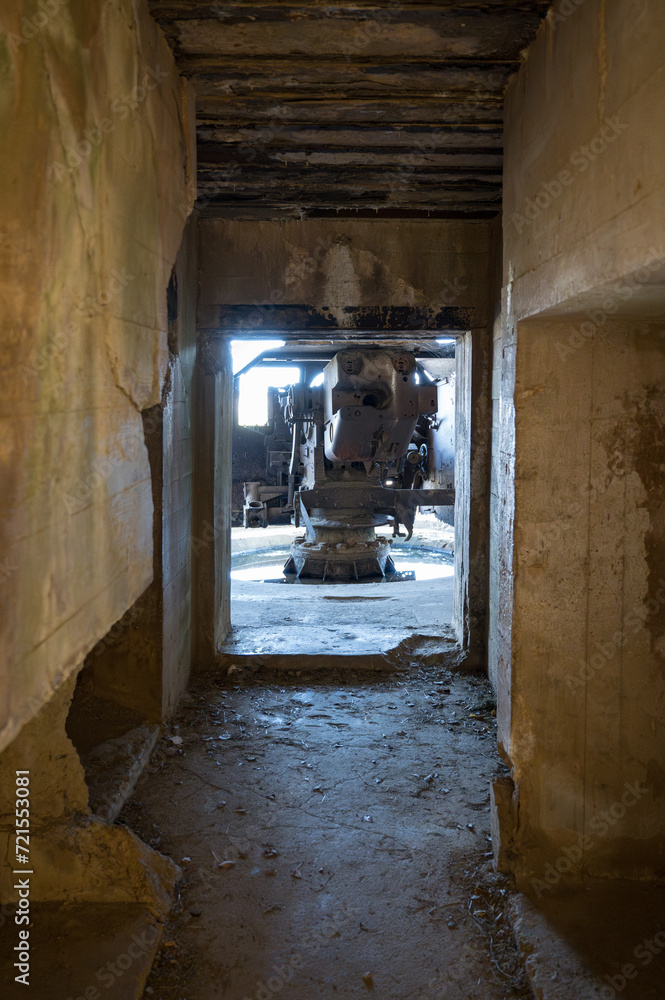 Interior view of the German defensive bunker of Longues Sur Mer, from inside the bunker behind the artillery gun. Corridor