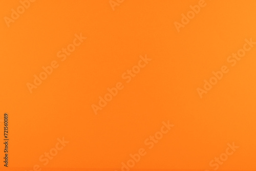 Fototapeta Naklejka Na Ścianę i Meble -  Fond uni pour création d'arrière plan de couleur orange foncé.