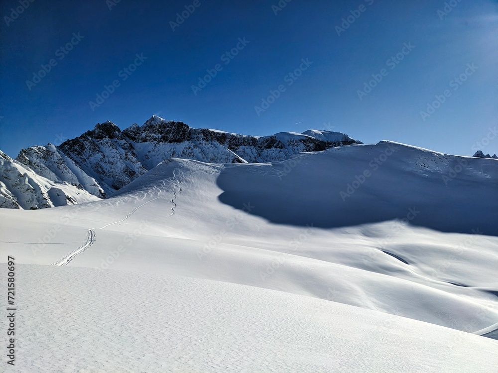 Ski tour to the Fanenstock and Färispitz above Elm. Large mountain panorama and beautiful winter landscape. High quality photo