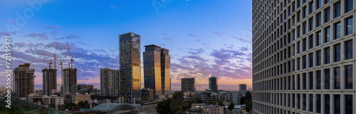 Israel, Tel Aviv financial business district skyline with shopping malls and high tech offices at sunset