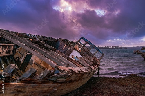 old destroyed boat on the beach