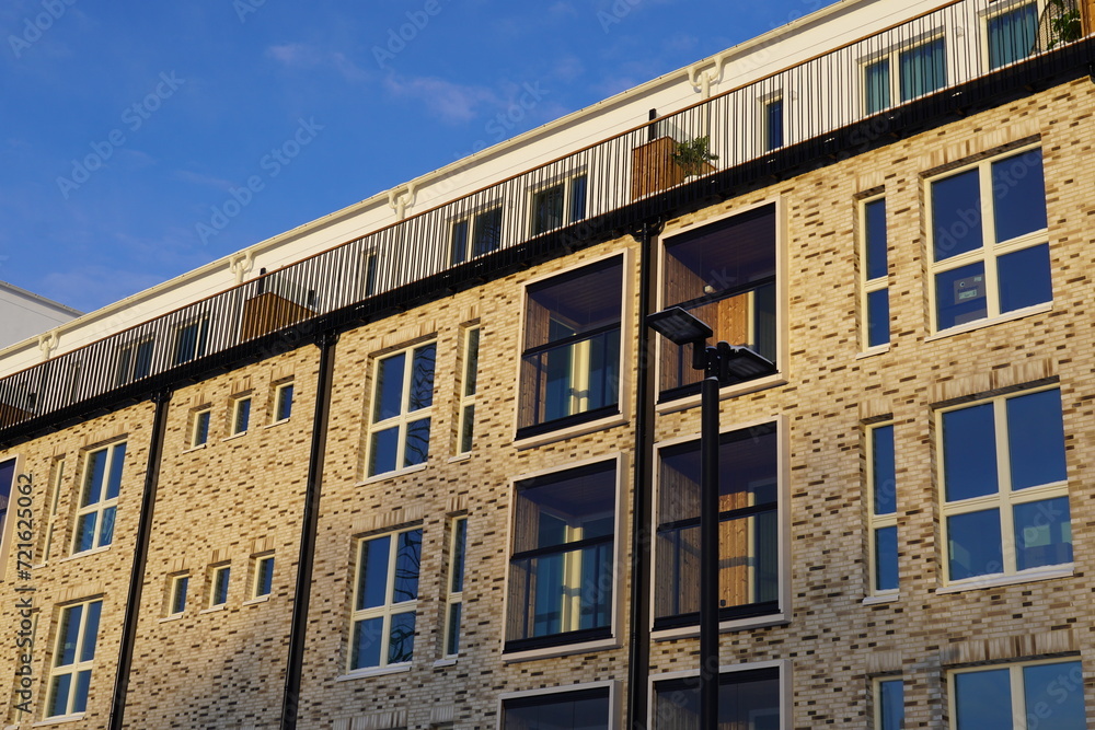 Close up of new modern building in Noblessner district. Blue sky on the back. Tallinn, Estonia, Europe. January 2024.