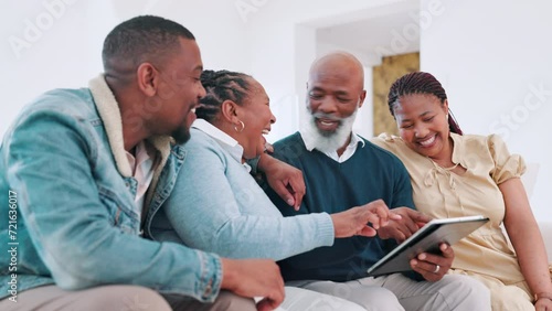 Tablet, happy and black family on sofa in living room of home together for bonding or visit. Smile, man and woman with senior parents talking in apartment for social media browsing on technology photo