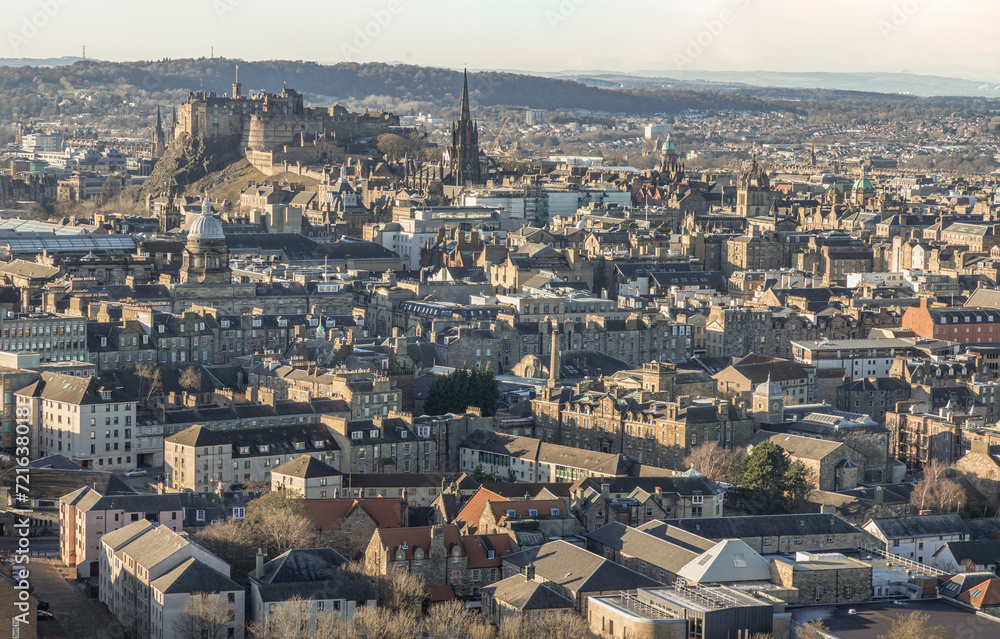 Edinburgh, Scotland - Jan 17, 2024 - Amazing Edinburgh Cityscape and Edinburgh Castle seen from the top of Salisbury Crags. Destinations in Europe, Space for text, Selective focus.