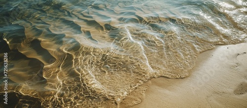 Serene Sand, Majestic Water, Exquisite Texture: A Captivating Exploration of Sand, Water, and Texture photo