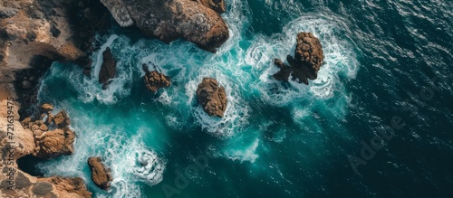 Captivating Aerial View of a Wild and Rocky Place with Soothing Se Waves