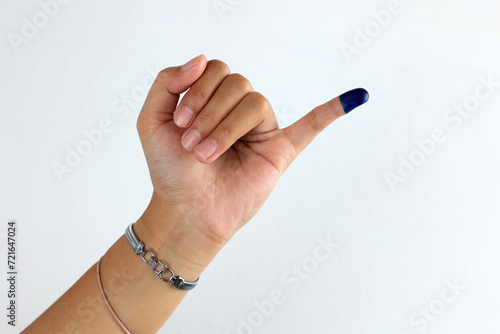Female Showed hand with Ink for Indonesian ELection or Pemilu Presiden photo