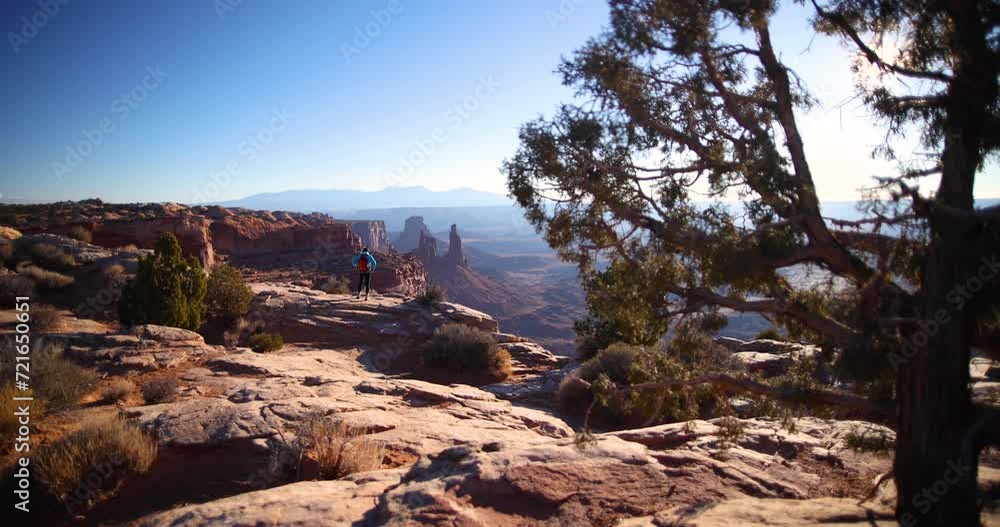 Female hydrating on adventure vacation Moab Utah USA Female hydrating on adventure vacation Moab Utah USA