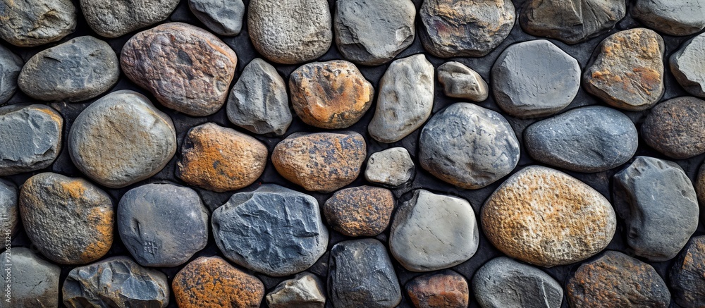 Exquisite Texture of a Wall Made with River Stone Exquisite Texture of a Wall Made with River Stone