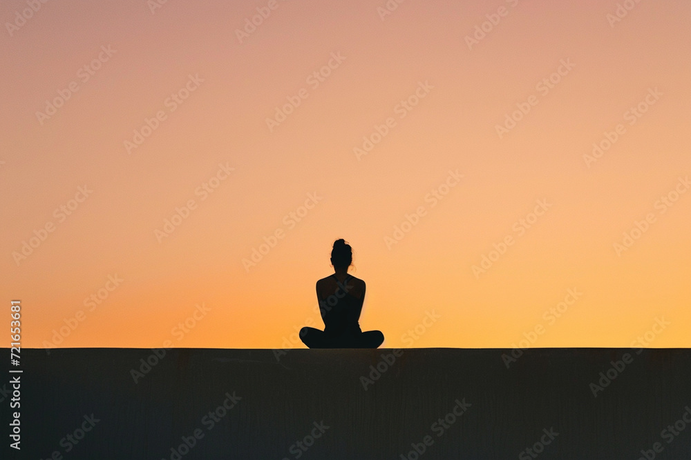 A minimalist shot captures the focused concentration of a yogi, their tranquil silhouette suspended in a perfect pose against a serene backdrop