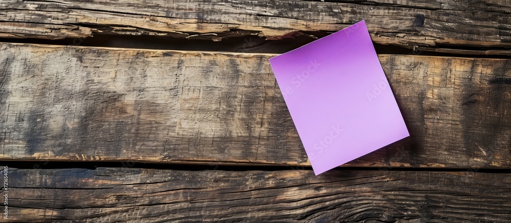 Eye-Catching Purple Sticky Note on Wooden Table - Perfect Template for Notetaking Eye-Catching Purple Sticky Note on Wooden Table - Perfect Template for Notetaking
