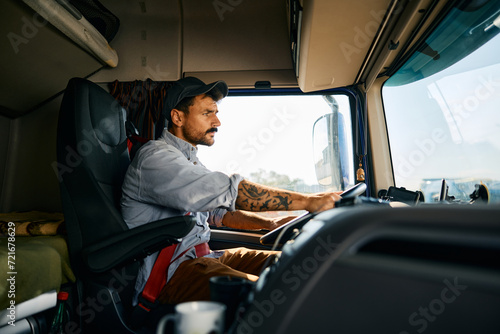 Quadro su tela Professional truck driver on road.
