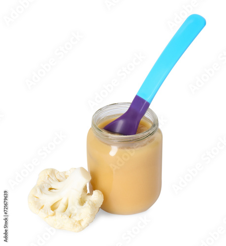 Tasty baby food in jar  spoon and fresh cauliflower isolated on white