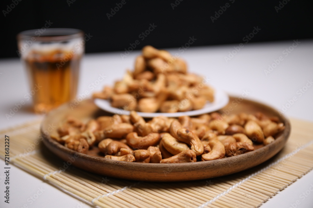 Grilled cashew nuts in a bowl Grilled cashew nuts in a bowl