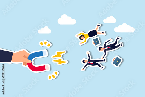 HR, Human resource recruiting candidates or talents, marketing to attract or draw new customers or leadership and charm concept, big employer hand using magnet power to draw new people employees.