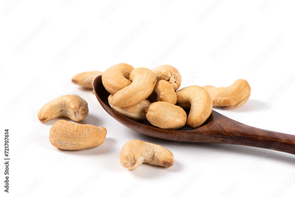 Fototapeta premium roasted salted cashew nuts isolated on whtie background.