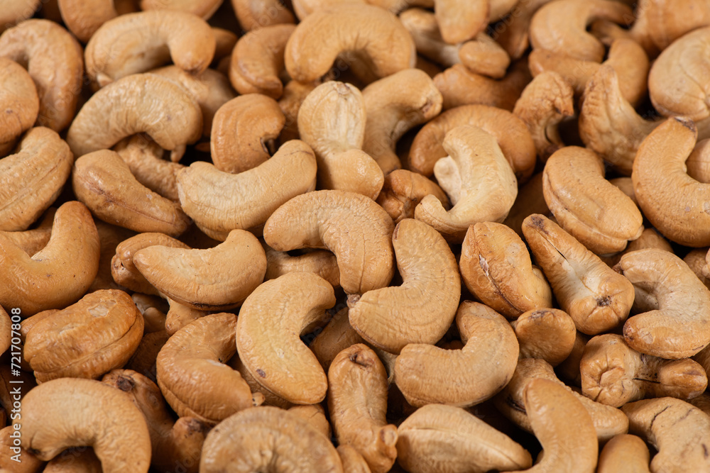 roasted salted cashew nuts texture background. roasted salted cashew nuts texture background.