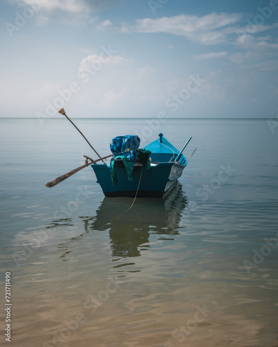 A small boat in the calm sea