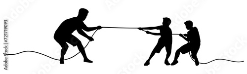 silhouette of a tug of war