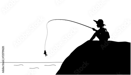 Little boy sitting and fishing in lake, boy with a fishing rod, fishing in the sea or on a river